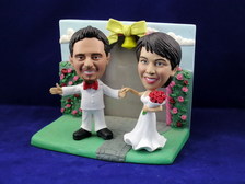 Bride and Groom Arms Outstretched With Rose Garden Frame Bobblehead - Bobbleheads.com